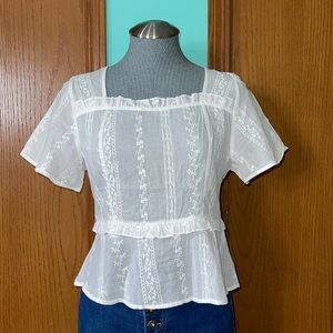 Zip Back Ruffle Embroidered Peplum Top